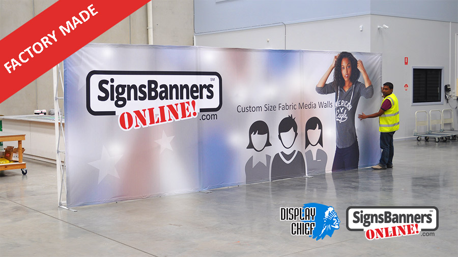 This custom printed media wall example stretches across three red carpet pop up stands and is customized to the clients stand size