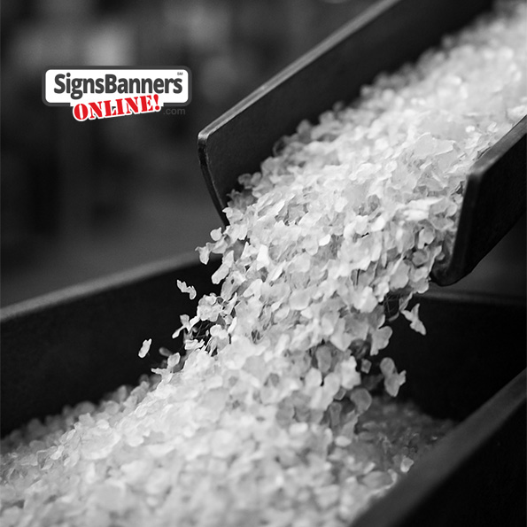 Plastic flakes floating down a recycling chute at the factory