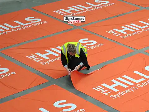 Banner Factory Inspection of the big printed discount signs and banners
