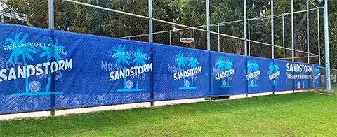 Large signage fitted to the beach volleyball arena