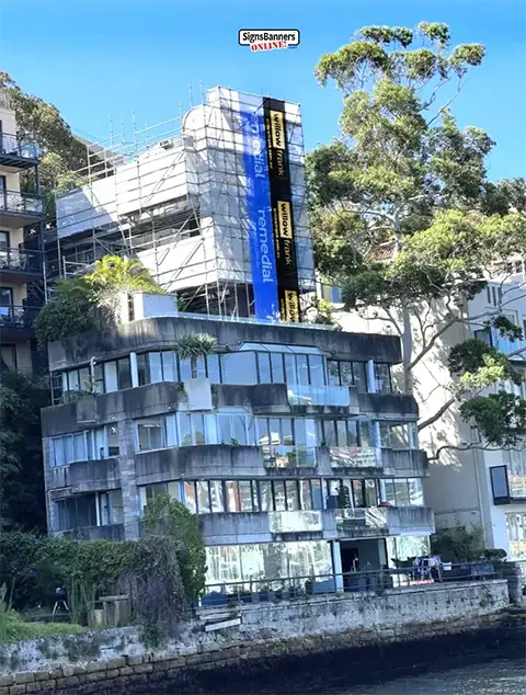 Produced for the bannershop, this vertical banner sign is fitted on a building