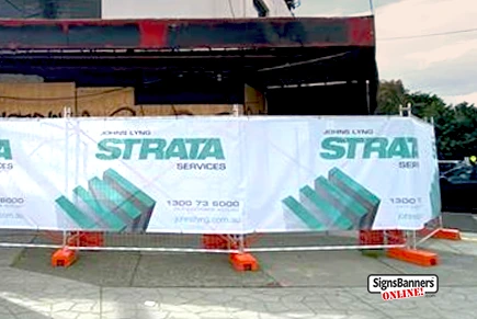 Doncaster Victoria Banner Mesh on temporary fencing outside burnt building under renovation and construction