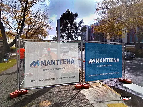 Here two standard mesh printed banners, one in white, the other in blue reverse design show the excellent show thru qualities of the mesh once attached as an advertising sign to a fence.