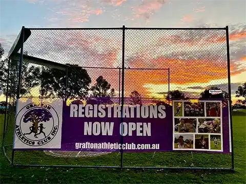 Put up - pull down sign for club at sunrise.