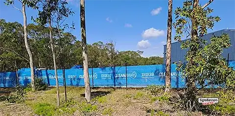 This image of the dust and rubbish containment mesh includes repeats of the Cleanaway logo and corporate color requirements.