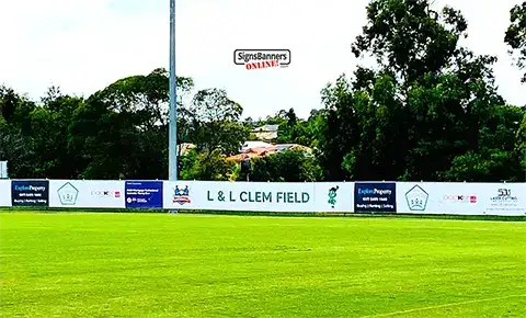 Sports ground advertising fence signage.