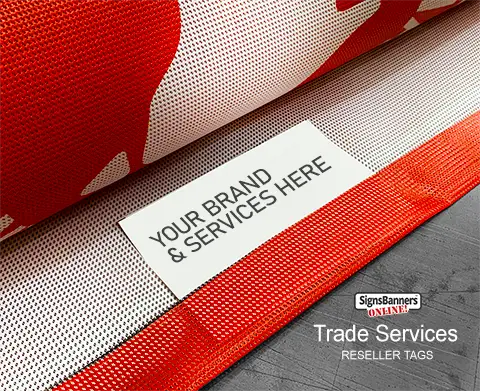 View of the Reseller and Trade Services Tag hemmed into the underside of a mesh banner marketing on a roll.