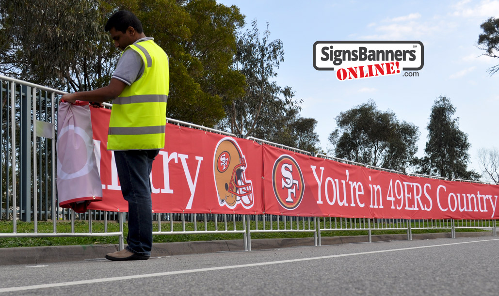 Winding up the event banner sign graphics for re-use next time - SF 49ers example