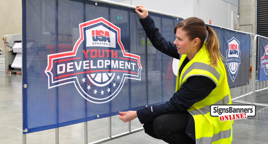 Zip onto the crowd rail, these dark mesh banner signs with USA Basketball Youth Development logo look amazing. Factory Made.